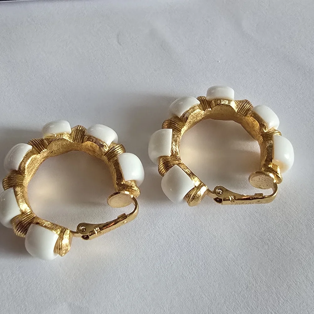 Vintage Trifari earrings Crown hoop white plastic gold tone metal clip on